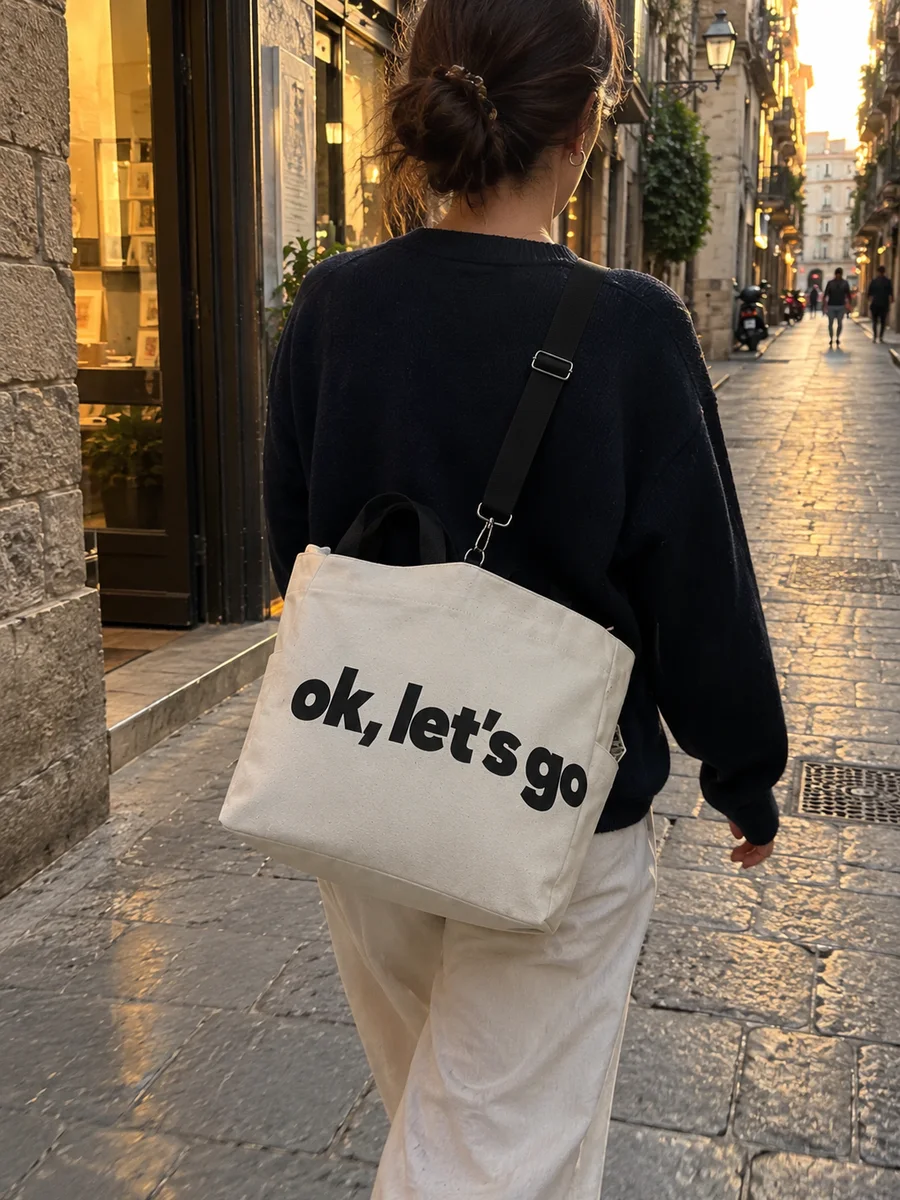 "ok, let's go" print, black strap, from behind