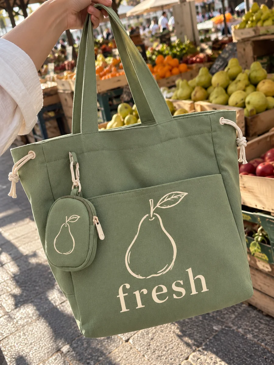 Olive bag, cream "fresh" line-art print, close-up